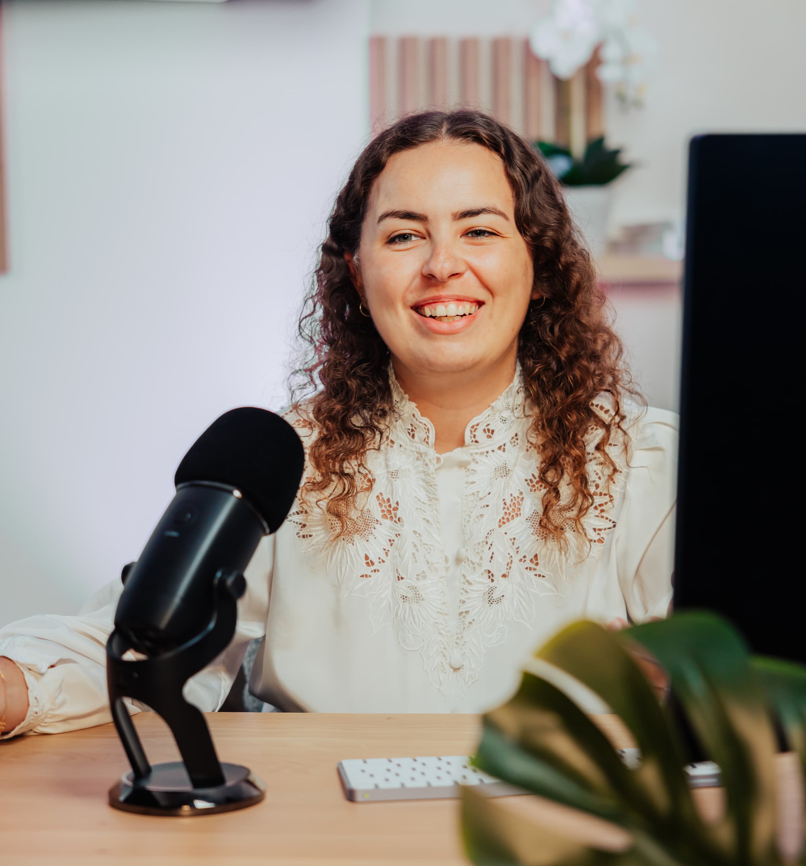 Instructor in a film studio showing a training video on the professional solution Ephoto Dam