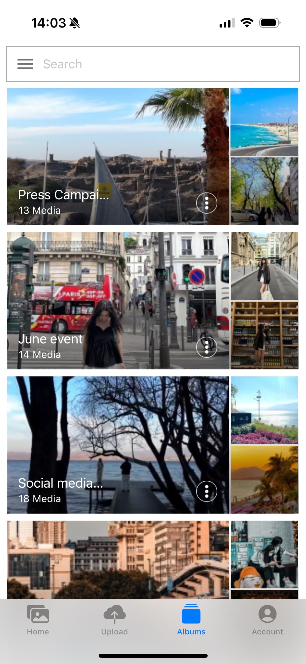 Ephoto Dam application interface on iOS showing album functionality.